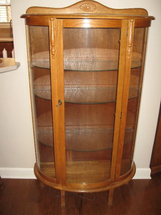 Beautiful Lighted Curved Glass Curio Cabinet...