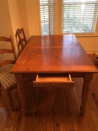 Solid pine table with six chairs
