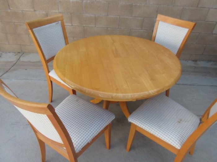 Small round kitchen table, great for smaller spaces; chairs need a little love on the fabric
