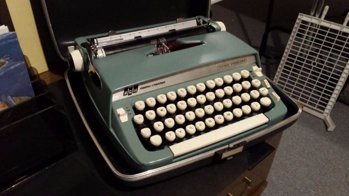 Aqua Smith Corona portable typewriter