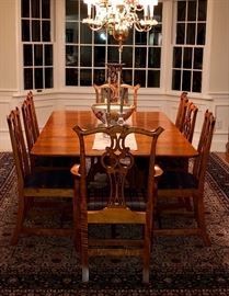 D.R. Dimes Lexington double pedestal tiger maple dining table with D.R. Dimes Chippendale style dining chairs. There are 10 chairs - 2 arm chairs and 8 side chairs. 