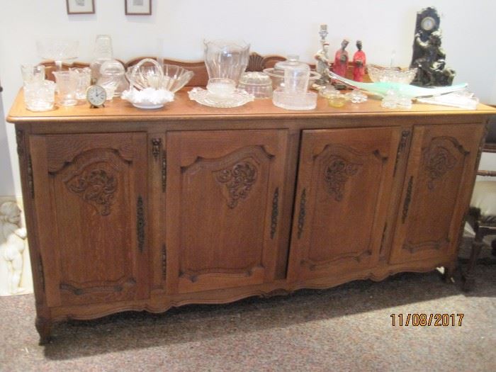 Nice carved server, has matching hutch and table with 6 chairs