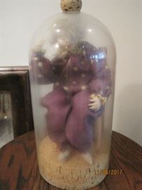 Wax Doll inside glass