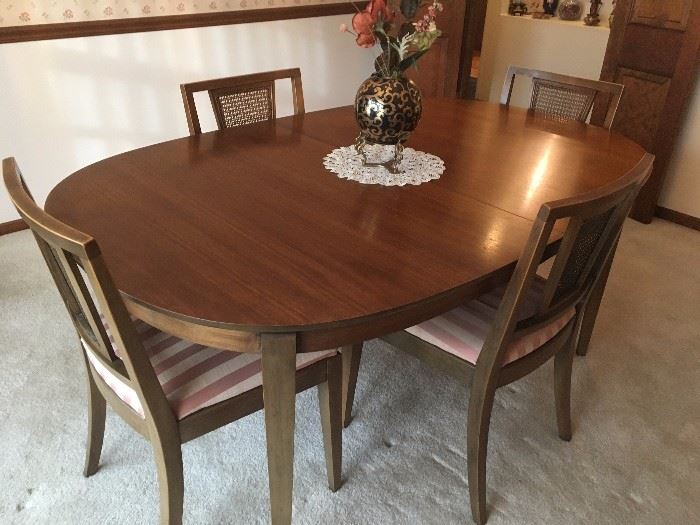 lovely dining set with pads and hidden leaves