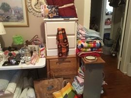 2 small end tables with drawers & shelf - shelf is full of more linens