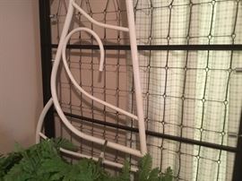 Trundle portion of bed and another headboard