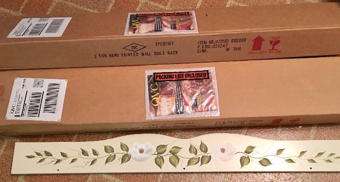 Two two-tier quilt racks, with hand-painted dogwood motif, in original packaging (one piece removed for photo and replaced)