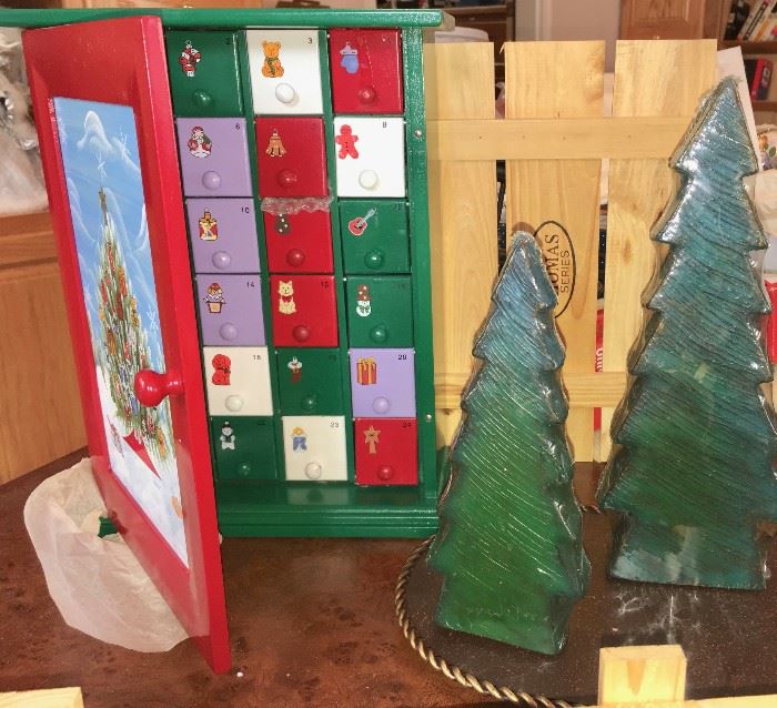 Advent-calendar wooden surprise box in original wrapping and faux-Christmas-tree candle set with base