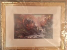 Framed Thomas Kinkade print in shrink wrap