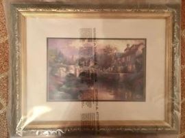 Framed Thomas Kinkade print in shrink wrap