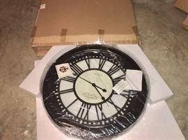 Extra large wall clock in box (another in unopened box is also available)