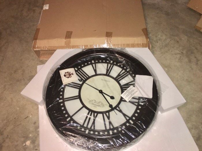Extra large wall clock in box (another in unopened box is also available)