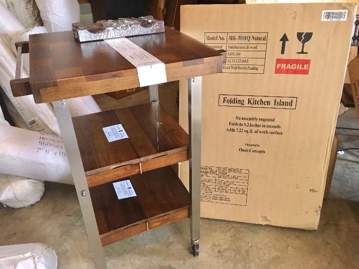 Folding kitchen island with original box (no assembly required), plus additional unopened island in box