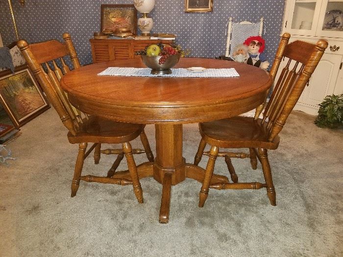 Round oak table and 2 chairs. 