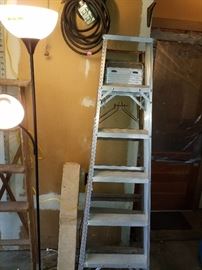 Metal ladder and 2 wooden ladders. Plus theres an extension ladder