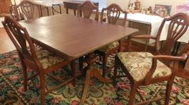 mid century dining room table with 5 chairs