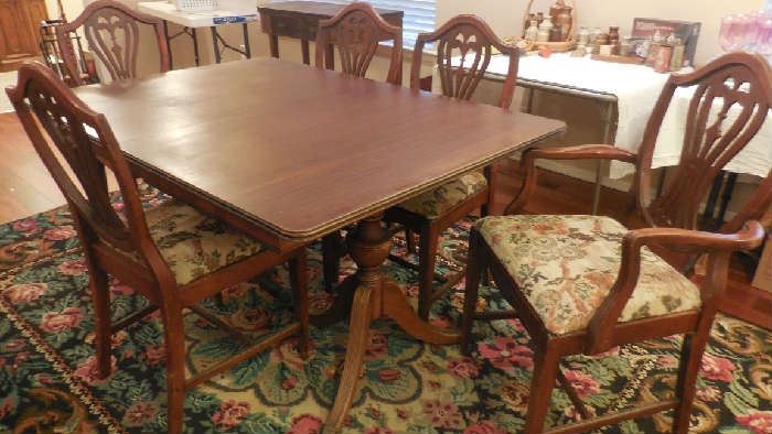 mid century dining room table with 5 chairs
