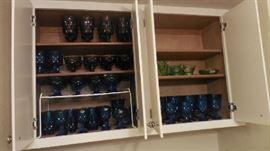 blue and amethyst color glasses, also green depression dishes