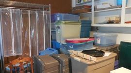 rolling racks, plastic bins, garment bags