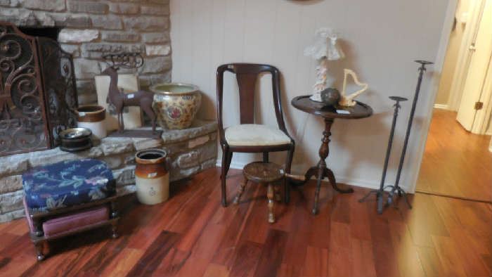 collection of many things, such as crocks, candle holders, Asian seat cushions, metal deer etc.