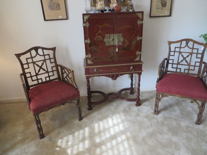 Pair of bamboo look chairs. Oriental cabinet is an old one.