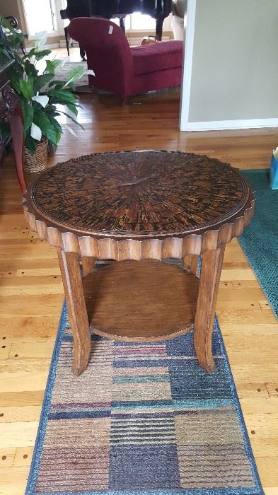 Designer table with inlaid top from Charles Cudd.