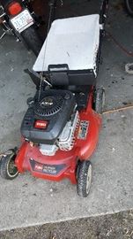 Toro lawn mower in very good condition except for the knob on the  handle (allows for the handle to fold up for storage).