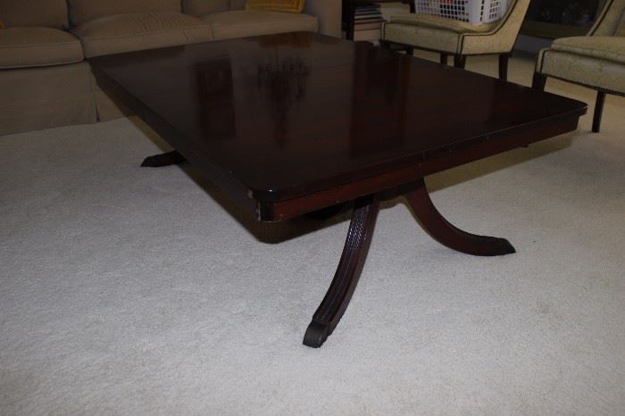 Duncan Phyfe dining table cut down to coffee table height.