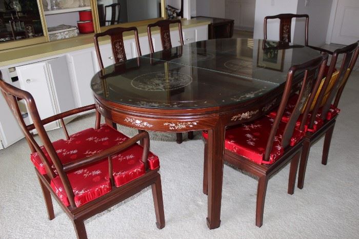 Asian themed oval diningtable with mother of pearl and abilone inlaid table, 6 chairs with removable satin cushions.