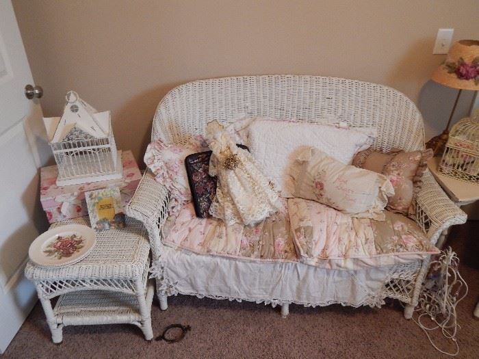 Wicker set includes Love seat, end table, and 2 chairs