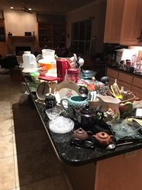 Kitchen full of dishes and appliances nice