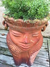 Several Lovely Planters Surrounding  Patio