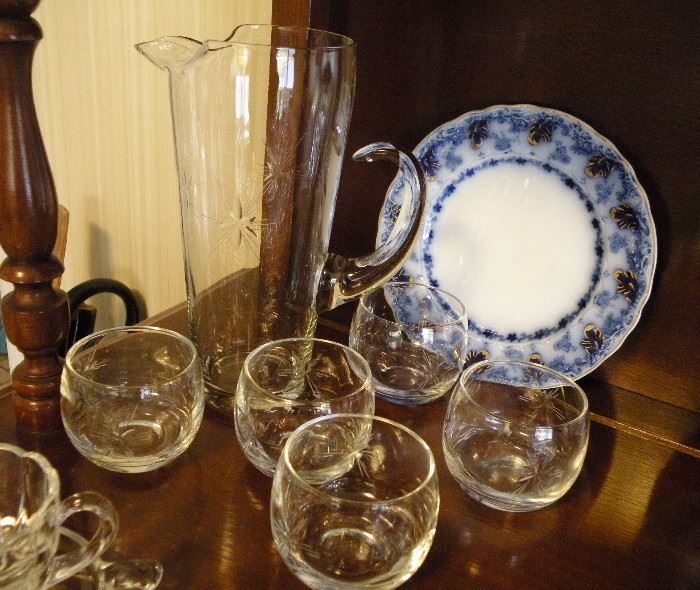 Vintage cocktail set. One of three flow blue plates.