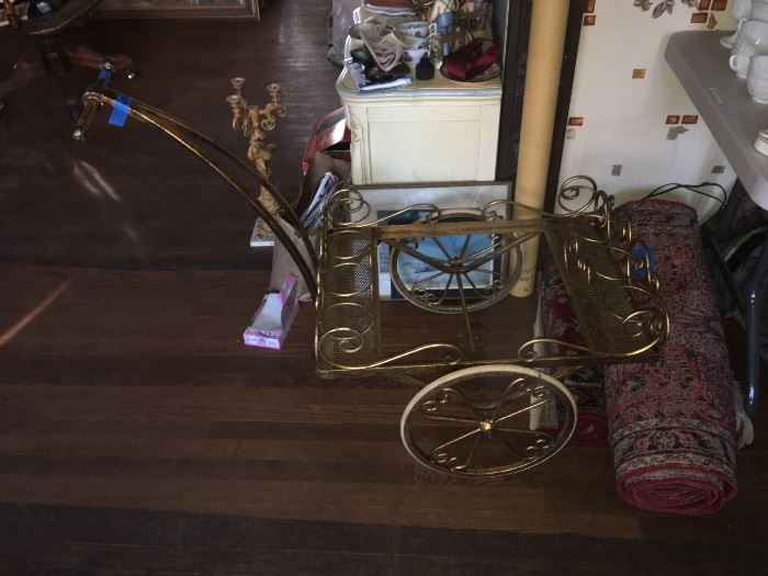 This is a Rolling Wine Cart...Neat piece but needs some TLC
