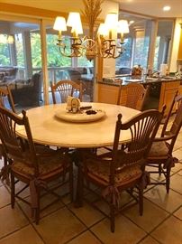 Table has two additional leaves and removeable Lazy Susan (pictured). Six chairs w/ rush seats.