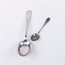 Lunt "Treasure" Sterling Silver Spoon and Sterling Silver Souvenir Spoon: A Lunt sterling silver tablespoon and a sterling silver souvenir spoon. The tablespoon by Lunt in the Treasure pattern features personalized engraving to the handle. The underside is marked, “Treasure,” with the Lunt maker’s mark followed by, “Sterling PAT 1921.” Included with the tablespoon is a sterling silver souvenir spoon feature chased reliefs to the handle and bowl. The underside of the handle is marked, “Sterling.” The total approximate weight is 1.015 ozt.