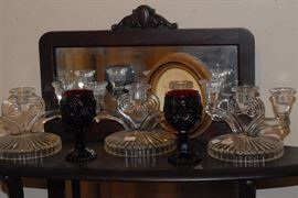 Nice collection of glass candelabras, many dating to the 30s and 40s