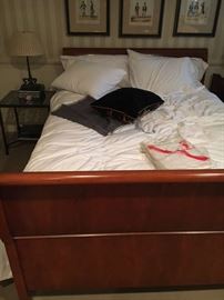 Queen sleigh bed (mattress and box spring not for sale)