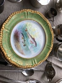 One of a set of 12 hand-painted plates
