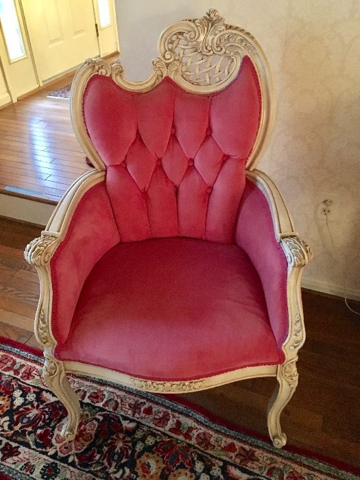 One of two pink French Provincial chairs