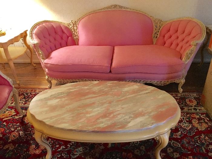 French Provincial sofa with pink marble coffee table