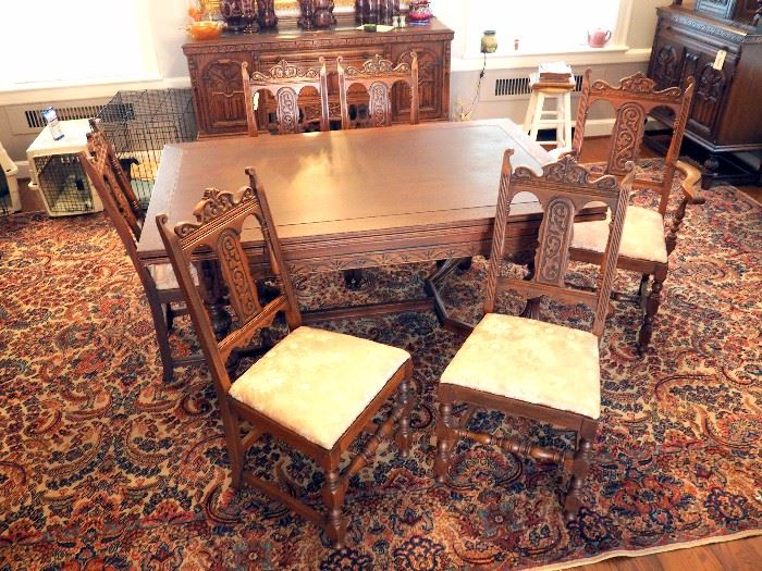 Intricately Carved Old English / Jacobean Dining Room Table And Matching Chairs, Qty 2 Captain's Chair, Qty 4 Dining Chairs