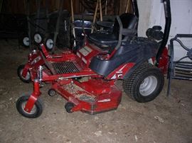 Riding lawn mower.