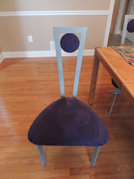 set of four custom designer chairs. 