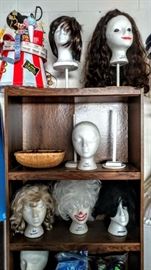 Variety of vintage foam heads and wigs