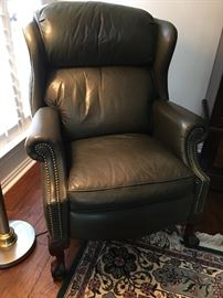 Bradington Young Leather Wingback Recliner in a subtle dark moss green  color.  