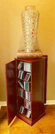 PEDESTAL OPENS TO STORE DVD'S                                          24" GOLD MIRRORED VASE