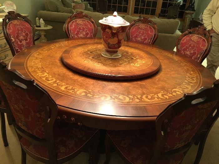 inlaid dining room with lazysusan and 8 chairs.