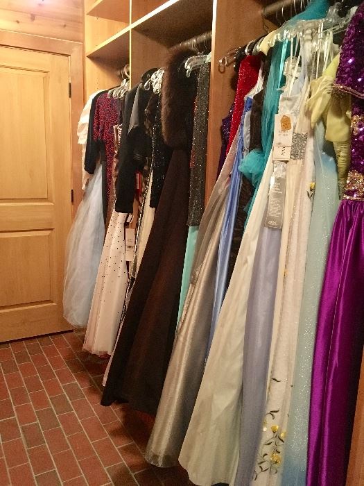 A closet of formal gowns & accessories 
