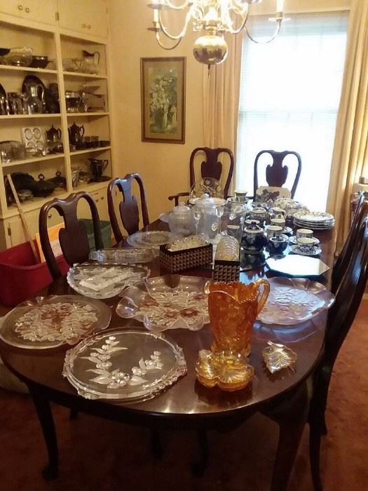 Beautiful Queen Anne style cherry table topped with amazing crystal serving pieces